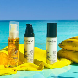 Kadalys products with bananas and ocean in background