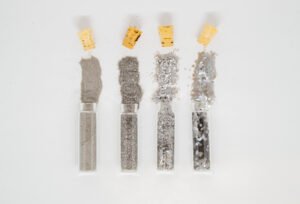 Today glitter, colors are in grey scale and glass bottles with cork lids