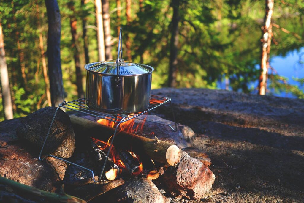 camp fire with cooking pot